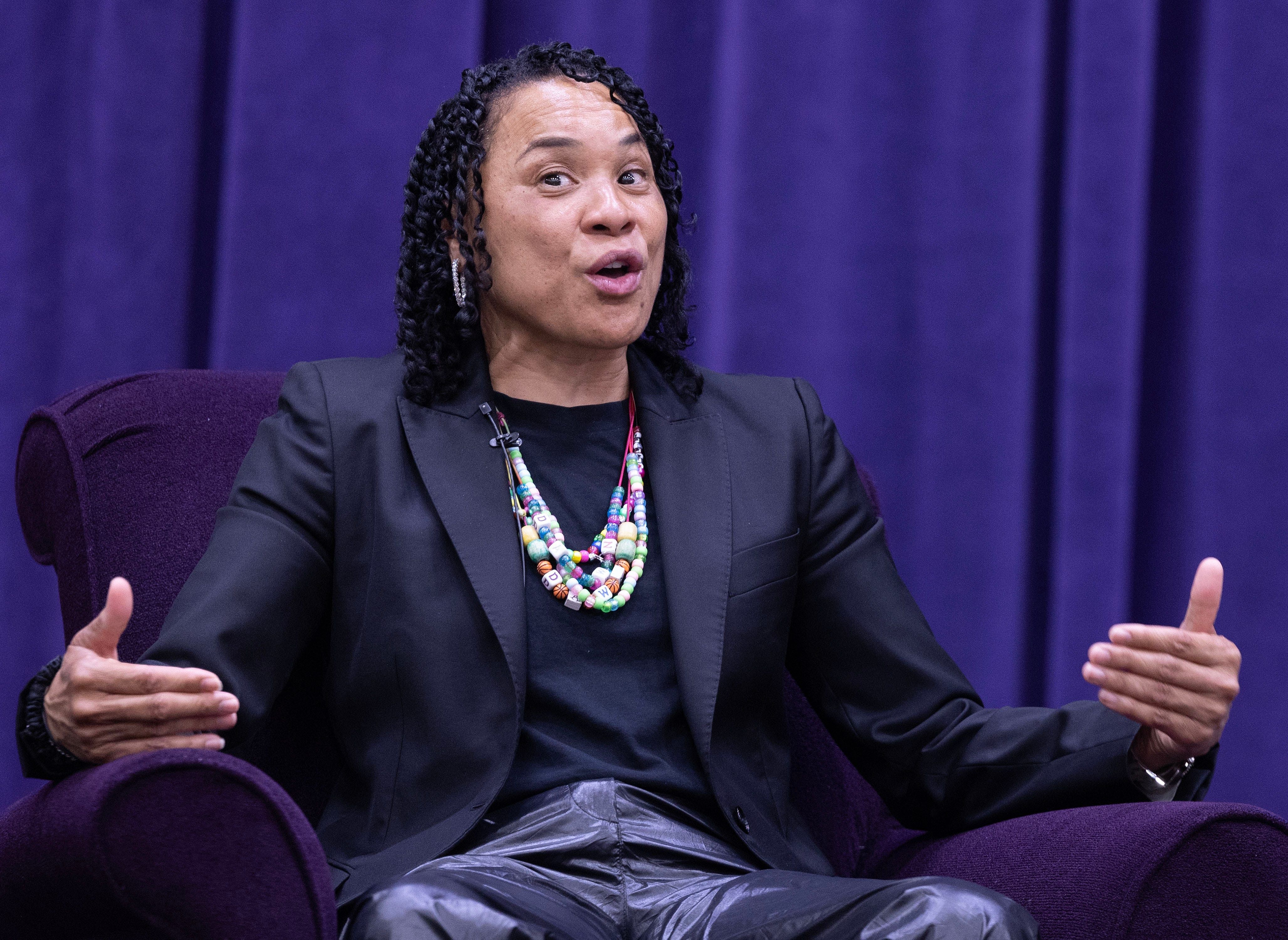 Dawn Staley answers a question by moderator Dan Hughes - Source: Imagn